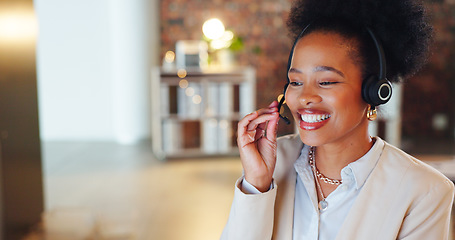 Image showing African woman, call center and talk in night, office and smile for telemarketing, voip mic and contact us. Consultant, crm and tech support agent with customer care, thinking and service at help desk