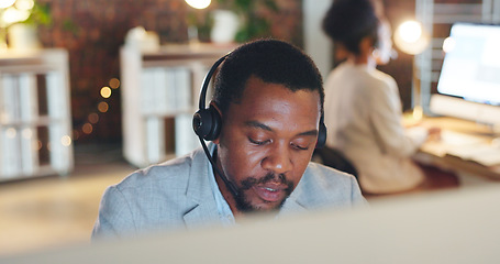 Image showing African man, call center and computer in thinking, talk or night for telemarketing, voip mic or contact us. Consultant, crm and tech support agent for customer service, idea or questions at help desk