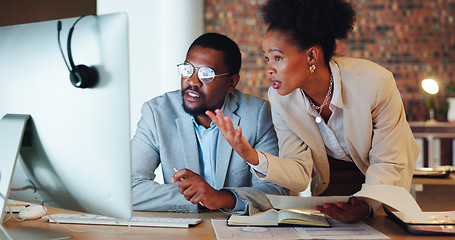 Image showing Collaboration, confused and a mentor with an employee in the office at night for project management. Computer, teamwork or planning with a problem solving business man and woman working together