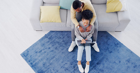 Image showing Top view, home and African couple with a laptop, relax and connection with internet, online reading and network. Apartment, man or woman with a pc, communication or bonding with website info or email