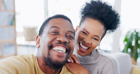 Image showing African couple, selfie and sofa with smile, hug and post on web blog, love and bonding in home. Black woman, man and photography for happy memory, profile picture and romance on social media in house