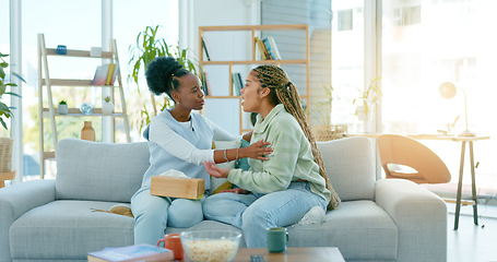 Image showing Sad women, friends and support on sofa in home, care and conversation for anxiety. African girls, depression and comfort on couch for kindness, empathy and help to console in communication together