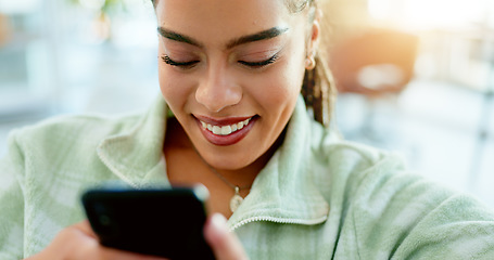 Image showing Happy, woman and typing with phone on sofa in home, living room or apartment with internet communication or contact us. Funny, meme or video on social media and person chat online with cellphone