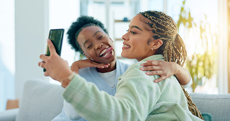 Image showing Selfie, funny and women with internet, hug and social media with a smartphone, connection and post. People, apartment or friends in a living room, facial expression and home with fun, silly and goofy