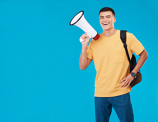 Image showing Portrait, megaphone and man with a smile, announcement and promotion on a blue background. Person, activist and happy model with a bullhorn, change and happiness with justice, speech and mockup space