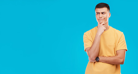 Image showing Thinking, inspiration and ideas, confused man in studio with future or solution on blue background. Why, question with problem solving and remember, mockup space with insight and memory or doubt
