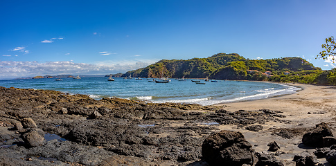 Image showing Playa Ocotal and Pacific ocean waves on rocky shore, El Coco Costa Rica