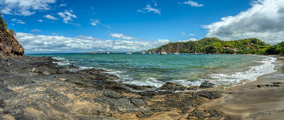 Image showing Playa Ocotal and Pacific ocean waves on rocky shore, El Coco Costa Rica