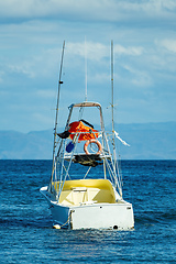 Image showing Motor boat anchored on Ocotal beach, Pacific ocean, El Coco Costa Rica