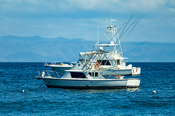 Image showing Motor boat anchored on Ocotal beach, Pacific ocean, El Coco Costa Rica