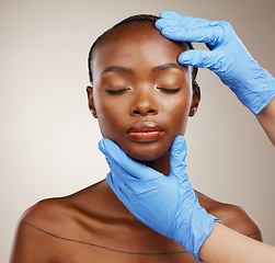 Image showing Portrait, hands and botox with a black woman patient in studio on a gray background for cosmetic change. Face, beauty and transformation with a young model getting ready for plastic surgery treatment