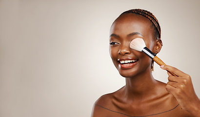 Image showing Skincare, black woman or makeup brush on eye for beauty, foundation or application in studio on brown background. Cosmetic, girl or face product for hygiene, aesthetic and mock up for facial or skin