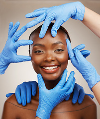 Image showing Portrait, hands and plastic surgery with a black woman patient in studio on a gray background for cosmetic change. Face, beauty and transformation with a young model getting ready for botox treatment