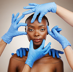 Image showing Portrait, hands and plastic surgery for change with a black woman patient in studio on a gray background for cosmetics. Face, beauty transformation and a young model getting ready for botox treatment