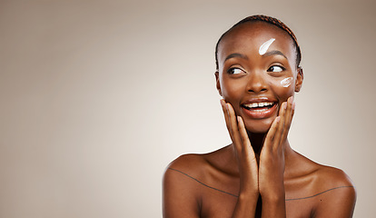 Image showing Beauty, smile and black woman with cream, thinking or dermatology on a grey studio background. African person, girl or model with creme, aesthetic or cosmetics with skincare mockup space or self care