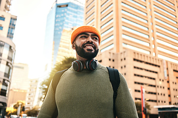 Image showing City, smile and black man travel, walking and happy on morning trip, outdoor journey and commute in Los Angeles. Happiness, urban town and African commuter, pedestrian or person in California, USA