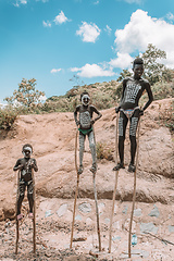 Image showing Boys with stilts from Bana tribe, Key Afer, Ethiopia