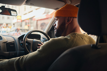 Image showing Driving, travel and man in a car for transportation, location search and in traffic in the morning. Thinking, driver and a person on a journey in transport for a commute or parking in the street