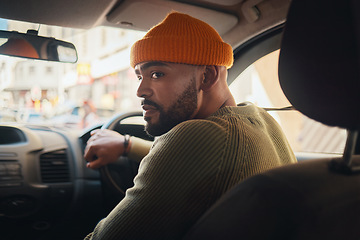 Image showing Driving, taxi and man in a car for transportation, location search and in traffic in the morning. Thinking, driver and a person on a journey in transport for travel, commute or parking in the street