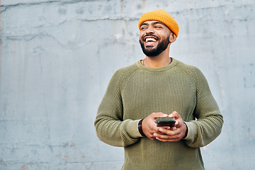 Image showing Phone, excited and young man by wall networking on social media, mobile app or the internet. Technology, happy and person from Colombia scroll on website with cellphone in city by gray background.