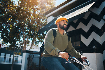 Image showing Bicycle, happy and man in city for travel, adventure and journey for weekend, holiday or vacation. Fashion, commute and person on bike for eco friendly transport, carbon footprint and cycling in road