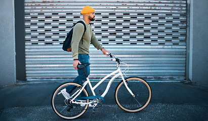 Image showing City, walk and man with bike in street for eco friendly transport to university in morning. Urban sidewalk, carbon neutral commute and college student with bicycle, backpack and sustainable travel.