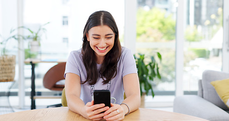 Image showing Phone, smile and young woman in the living room networking on social media or mobile app. Happy, technology and female person from Canada scroll on the internet with cellphone in lounge at apartment.
