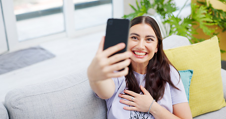 Image showing Woman, video call and sofa with smile, home and happy on web blog, internet and relax in living room. Influencer girl, excited and live streaming for memory, contact and social network app on couch