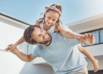 Image showing Father playing, piggyback or child in new home as a happy family on real estate with love, smile or care. Airplane, flying or fun kid with proud dad on property in relocation together in dream house