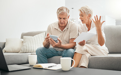 Image showing Frustrated senior couple, documents and financial crisis on living room sofa in debt, expenses or bills at home. Mature man and woman checking finance, paperwork or budget with calculator for invoice