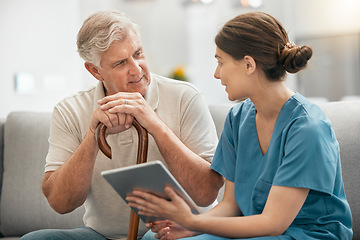 Image showing Woman, nurse and tablet in elderly care, consultation or visit in retirement home for healthcare advice. Female person or medical caregiver talking to retired man or patient with technology on sofa