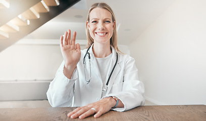 Image showing Doctor, portrait or wave on video call with smile at desk for a telehealth service or hello for kindness. Face, sign language or happy woman in webinar teaching healthcare, help or advice online
