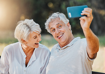 Image showing Senior couple, tongue and selfie in outdoor nature garden for love memory, connection and retirement emoji. Elderly man, funny face and laughing woman for social media photography and profile picture