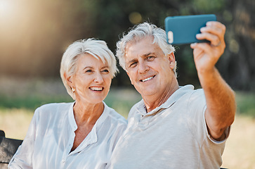 Image showing Happy couple, senior and selfie in nature garden for love memory, connection and relax retirement in Australia. Elderly man, smile and woman with photography for social media, profile picture and fun