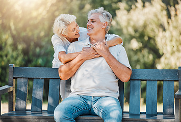 Image showing Happy couple, senior and hug on park bench for love, support and bonding together in retirement and nature garden. Smile, relax and elderly woman embrace man in Australia backyard for marriage trust