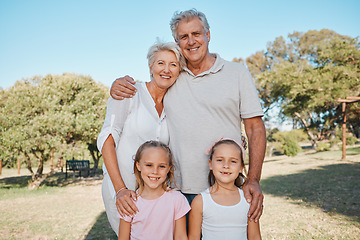 Image showing Nature, portrait and happy family, children and grandparents enjoy time together, outdoor wellness or park grass field. Smile, love and relax grandma, grandpa or people bonding with kids in Australia