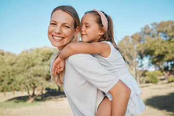 Image showing Piggyback, portrait and happy family child, mother and people enjoy nature time together, love or fun outdoor game. Happiness, care and walking woman, mama or mom bonding, carry and support young kid