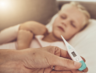 Image showing Thermometer, mom and sick child on sofa for cold, flu or medical care for children in home. Healthcare, fever and mother with sleeping daughter on couch with digital temperature check in living room.