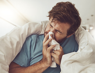 Image showing Man, blowing nose and sneezing, sick with allergies or influenza, virus and bacteria with health fail at home. Toilet paper, illness and healthcare with crisis or blanket, medical condition and flu