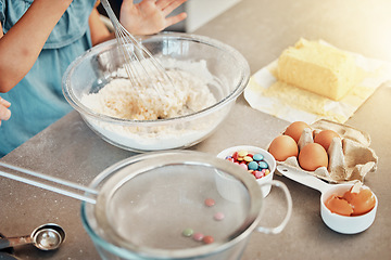 Image showing Hands, baking and bowl with flour, butter and eggs in home, kitchen or counter with people mixing recipe ingredient. Chef, cooking or baker prepare food with equipment in process or person whisk eggs