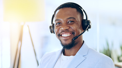 Image showing Portrait, call center and happy black man in telemarketing, support and help desk in office in Nigeria. Customer service, sales agent and face smile of African business professional in headphones