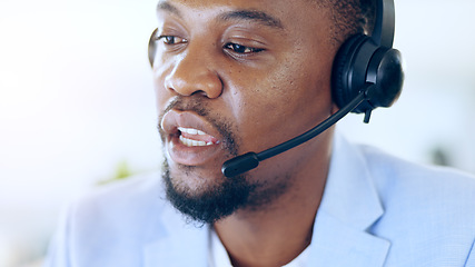 Image showing Crm, call center and black man talking for telemarketing, tech support or help desk in office. Customer service, sales agent and serious African consultant in communication, online advice or business