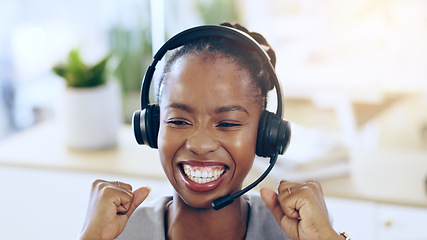 Image showing African woman, call center and celebration in office for contact us, achievement or smile for promotion. Consultant, thinking and customer service agent for success, headphones and fist at help desk