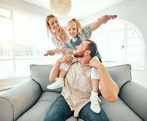 Image showing Parents, child and airplane on sofa, smile or portrait for love, care or bonding in living room at family house. Father, mother and daughter for plane game, excited and relax on lounge couch in home