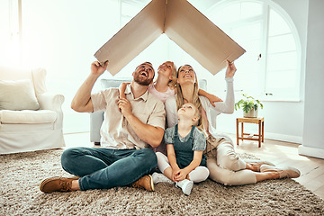 Image showing Family, children and parents in living room, cardboard roof and protection with security, enjoying and playing..Insurance, mom and dad for life cover, home and bonding on floor, playful and affection