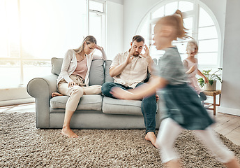 Image showing Family, adhd children and parents headache, stress and anxiety for autism management, energy fatigue or home noise. Tired mother and father on sofa with chaos and hyper or fast, excited kids running