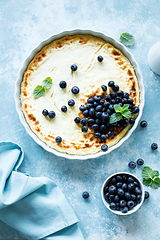 Image showing Cottage cheese cheesecake with fresh blueberry, top down view
