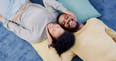 Image showing Top view, home and black couple with love, marriage and romance with bonding, relationship and relax together. Happy, African man or woman on the ground, hug or romantic with happiness, trust or care