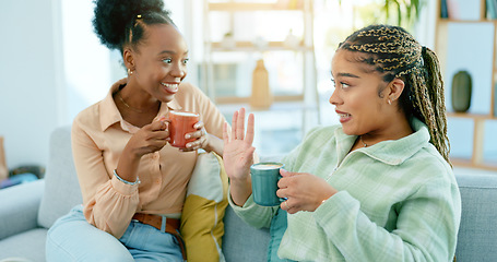 Image showing Woman, best friends and talk with coffee in living room with smile, happiness or excitement. African, people and bonding with gossip, conversation or discussion for advice on sofa, joke or tea in cup