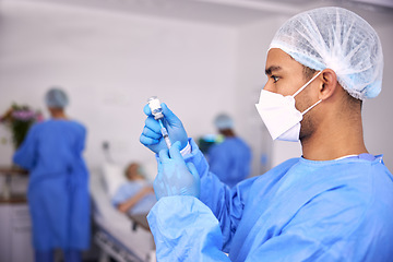 Image showing Man, doctor and syringe for vaccine, injection or cure in healthcare with face mask at hospital. Male person, medical nurse or surgeon with needle and vial for flu shot, vaccination or antibiotic